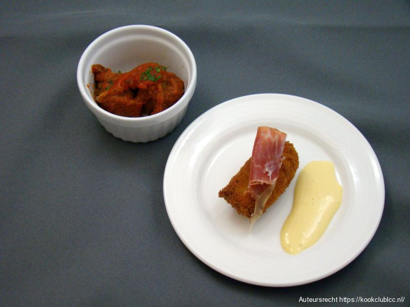 Jamon Iberico kroketjes en Albóndigas con salsa de tomate